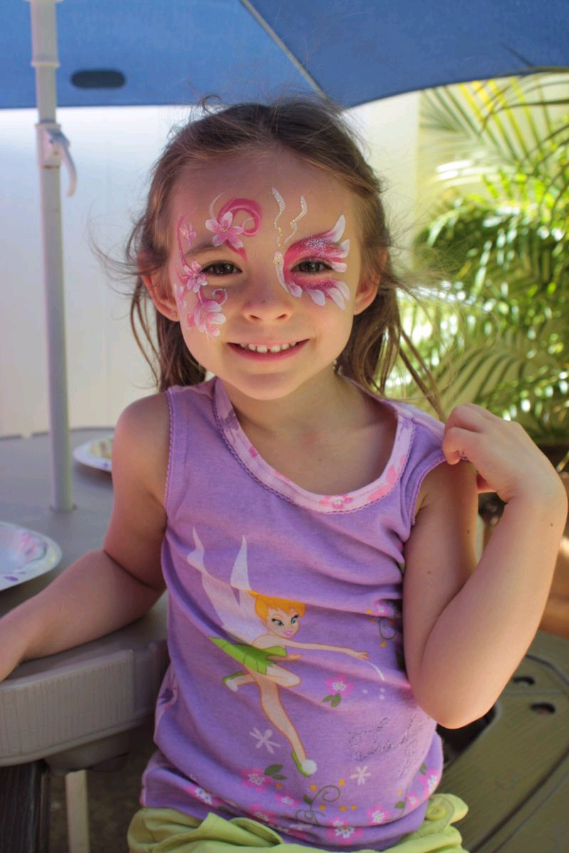 Kayla pretending to be happy at her 4th birthday